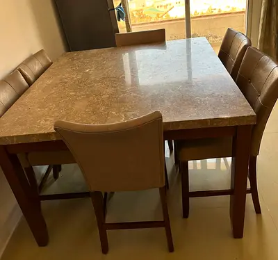 Marble-top dining table with 6 upholstered chairs - solid wood base