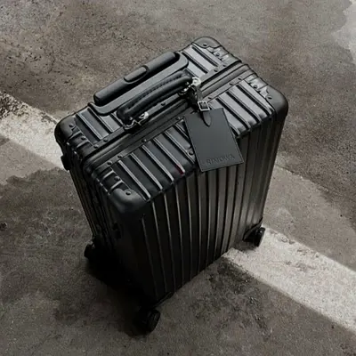 Rimowa classic black with black handle suitcase