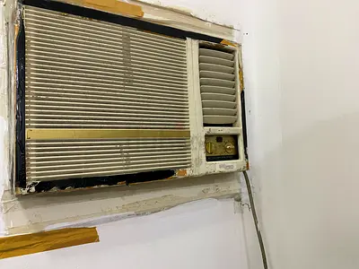Used window air conditioner unit - needs servicing
