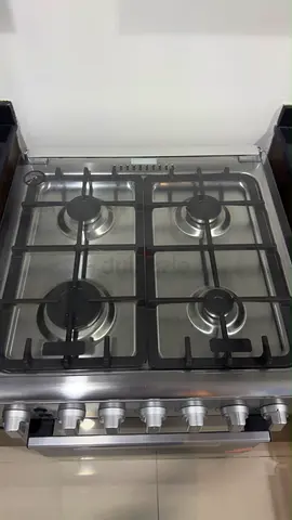 Stainless Steel 4-Burner Gas Stove with Oven - Good Condition