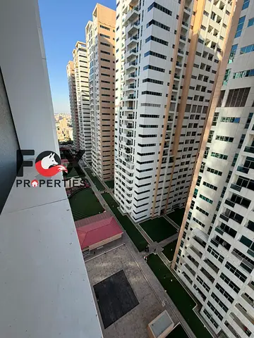 For Sale in Ajman One Towers – Ajman | 2-Bedroom Apartment | 1,450 Sq. Ft. | Built-in Wardrobes | 2 Balconies with Open View | Prime Location