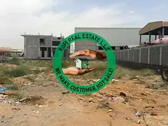 corner plot on main road available for rent on long term lease in New modern industrial area UAQ.