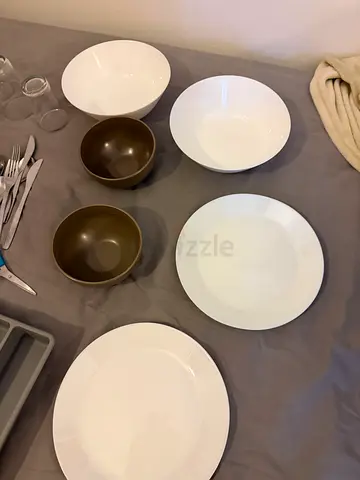 Mixed kitchenware set — plates, bowls, utensils, cutlery tray (used)