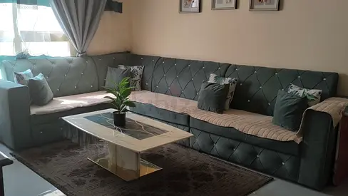 Large L Shape Green Sofa. With Coffe Table and Mat .Suitable for 10 people.