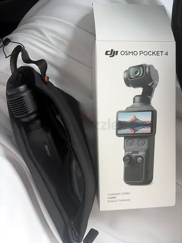 DJI Osmo Pocket 4 with Original Box and Carry Case - Excellent Condition