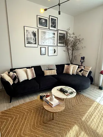 Curved Black Fabric Corner Sofa — Excellent Condition