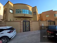 For annual rent in Al Rawda 1 area: a villa with five master bedrooms, a majlis, a living room, and