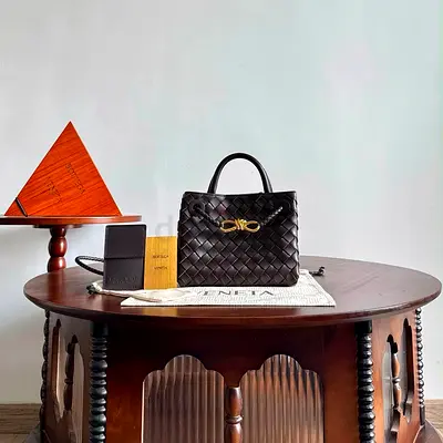 Bottega with certificate Black woven leather top-handle handbag with gold-tone clasp