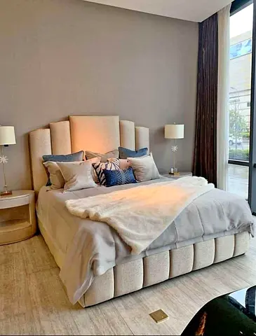 Modern Upholstered Bed with Panelled Headboard