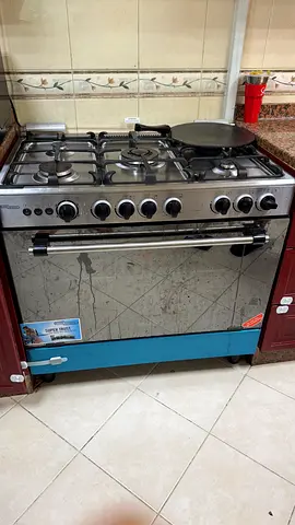 5-burner stainless steel gas range with oven - used
