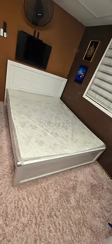 White wooden double bed frame with mattress included
