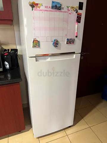 White single-door refrigerator in good working condition