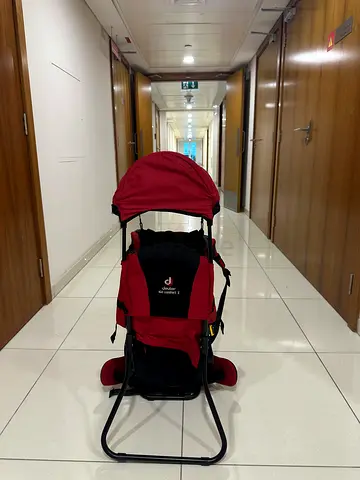 Lightweight red baby carrier for hiking in good condition