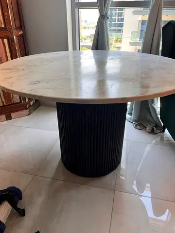 Marble top round dining table with solid wood bottom