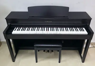 The Yamaha CLP-545 R (Dark Rosewood finish) is an advanced digital piano featuring the flagship