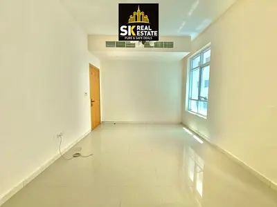 "Hot Offer: Two-Bedroom Apartment with One Month Free, Open View, Balcony, Family Building, Easy Dubai Access.