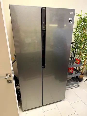 LG side by side Refrigerator new model very good condition