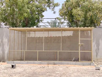 Large outdoor bird aviary / flight cage, metal mesh with roof and door