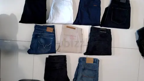 Lot of 9 mens jeans and casual trousers - mixed sizes and colors