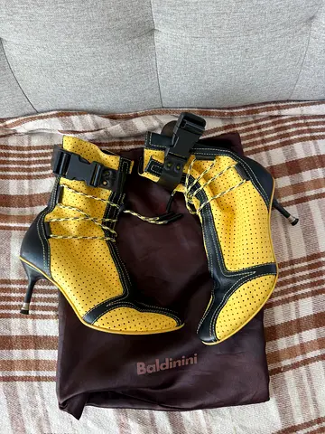 Yellow and black Baldinini perforated leather high-heel ankle boots - womens