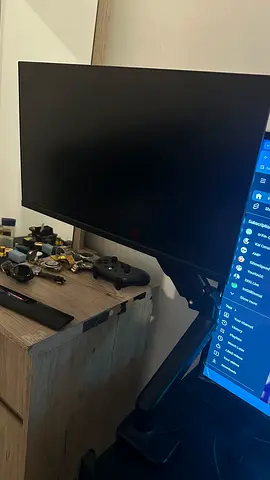 32-inch LED Monitor on Adjustable Desk Arm - Good Condition