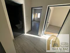 Apartments for annual rent in Al Majaz, two bedrooms, living room, two bathrooms, first occupancy, f