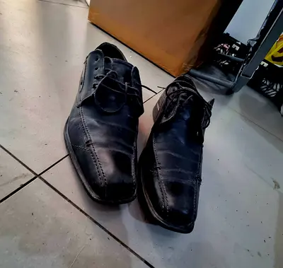 Used Bugatti black men’s leather dress shoes - size 43, good condition