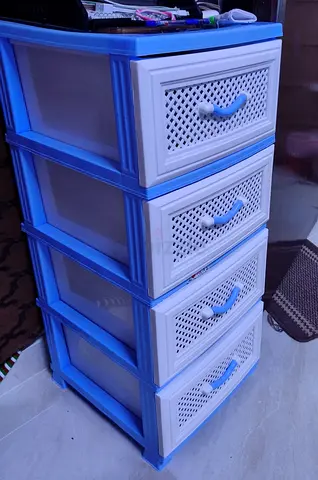 Blue plastic 4-drawer storage cabinet - lightweight organizer