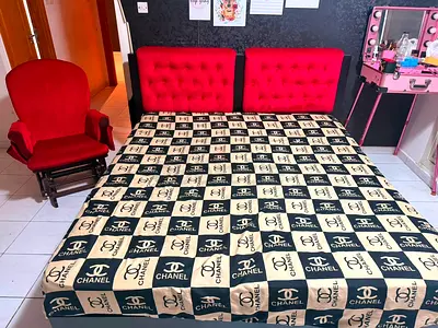 Double bed frame with tufted red headboard, good condition