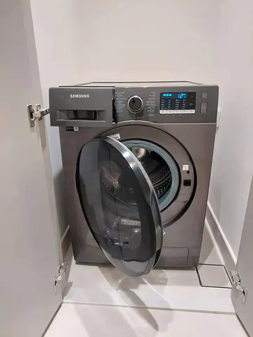 Samsung 8 kg washer and 6 kg dryer 2 in one new model slightly used