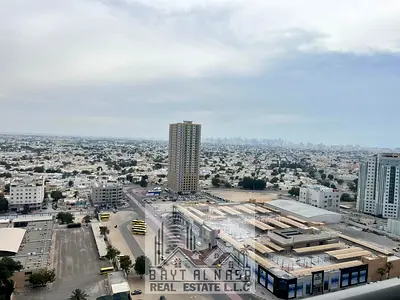 STUNNING SHARJAH VIEW FROM 1BHK BALCONY FULL FURNISHED APARTMENT WITH PARKING ON MONTHLY BASIS IN CITY TOWERS