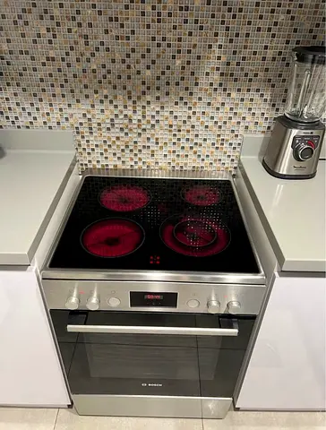 Bosch new latest model ceramic electric stove top 4 hobs 60by60cm size excellent working good condit