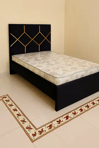 Double size bed frame with mattress — black upholstered headboard