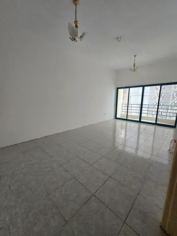 For rent in Al Qasba Sharjah (Al Majaz 3), spacious 3BR apartment, 4 bathrooms, maid room, 2 balcon
