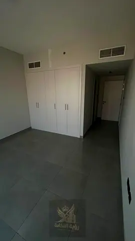 Spacious one-bedroom apartment with a living room for rent in Muwailih New – directly opposite Al B