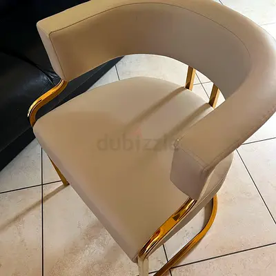 Cream faux leather dining/desk chair with gold frame