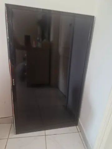 Sony big flat screen TV + wall mount