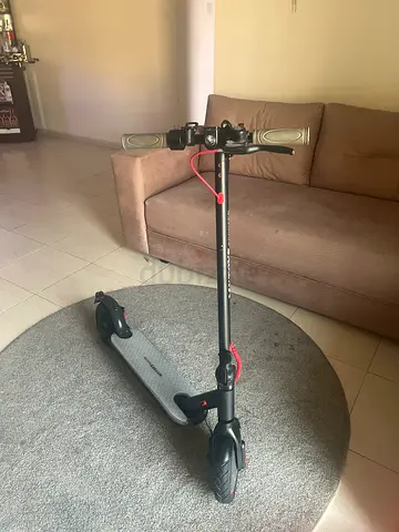 Electric kick scooter with LED deck - good working condition
