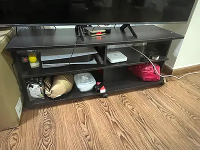 Dark wood TV stand / entertainment unit with open shelves