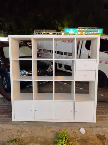 White Multi-Compartment Storage Shelf Unit with Drawers and Cabinets