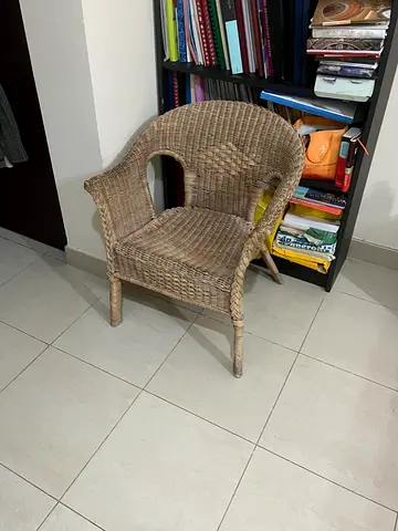 Natural woven rattan/wicker armchair in good condition