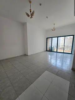 Spacious 2-bedroom apartment with balcony, 2 bathrooms, central AC and gas in Al Qasba, Al Majaz 3.