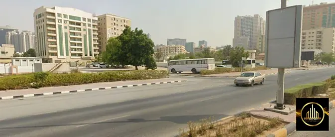 Residential and commercial plot on the corner of three streets (G+6), in a prime location on Al-Shakh Rad Bin Hamid Street, freehold