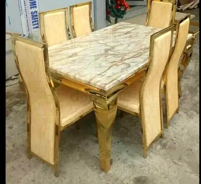 Brand new Top Mrable dinning Table with 6 Chairs Available