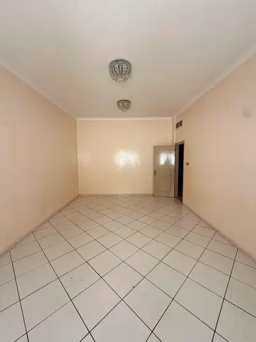 English Annual apartment for rent in Al Majaz 3 near the park Two bedrooms two living rooms two bathrooms and a balcony Spacious layout Rent AED 4200