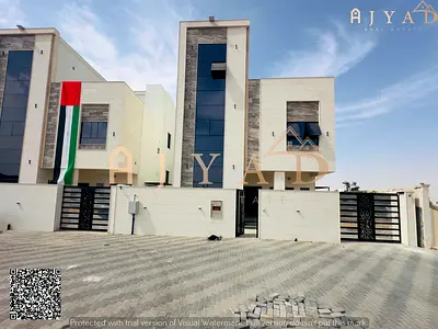 للإيجار: فيلا في الحليو 2 عجمان، طابقين وروف، مجلس، صالتين، 6 غرف نوم ماستر، خزائن مدمجة، 8 حمامات، غرفة خادمة، غرفة تخزين، أرض 3014 قدم، بناء 3600
