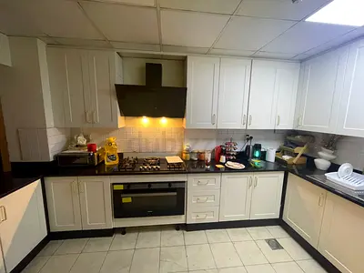 Modern White Shaker Kitchen with Black Granite Countertop – Excellent Condition - Used