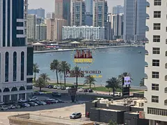 2BR with balcony in Al Majaz 1, 2 baths, open & partial sea view, panoramic windows, built-in wa