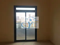 Spacious one-bedroom apartment in Al Rashidiya 2 with central air conditioning and a prime location