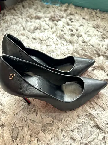 Christian louboutin Black leather pointed-toe high heels, gently used